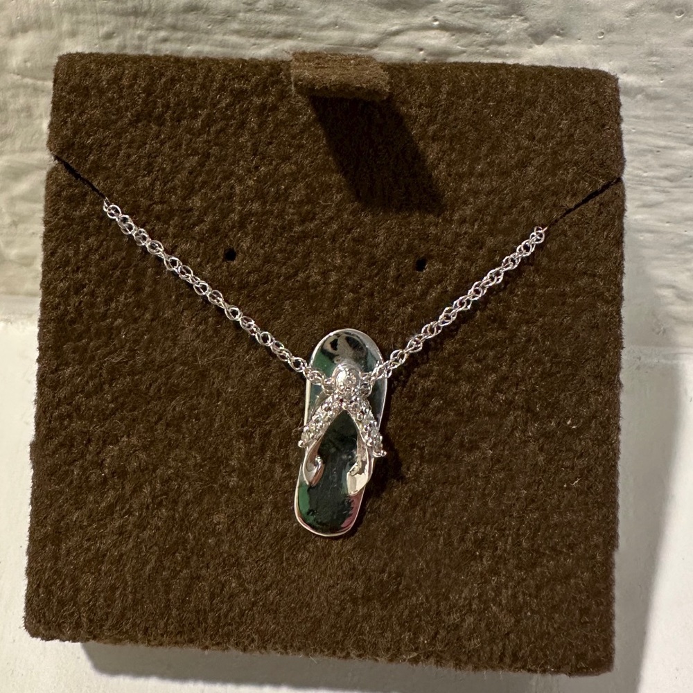 1/20 cttw 925 Sterling Silver Diamond Flip Flop Necklace 18in Chain Included.